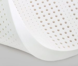 White perforated latex foam commonly used for mattresses.